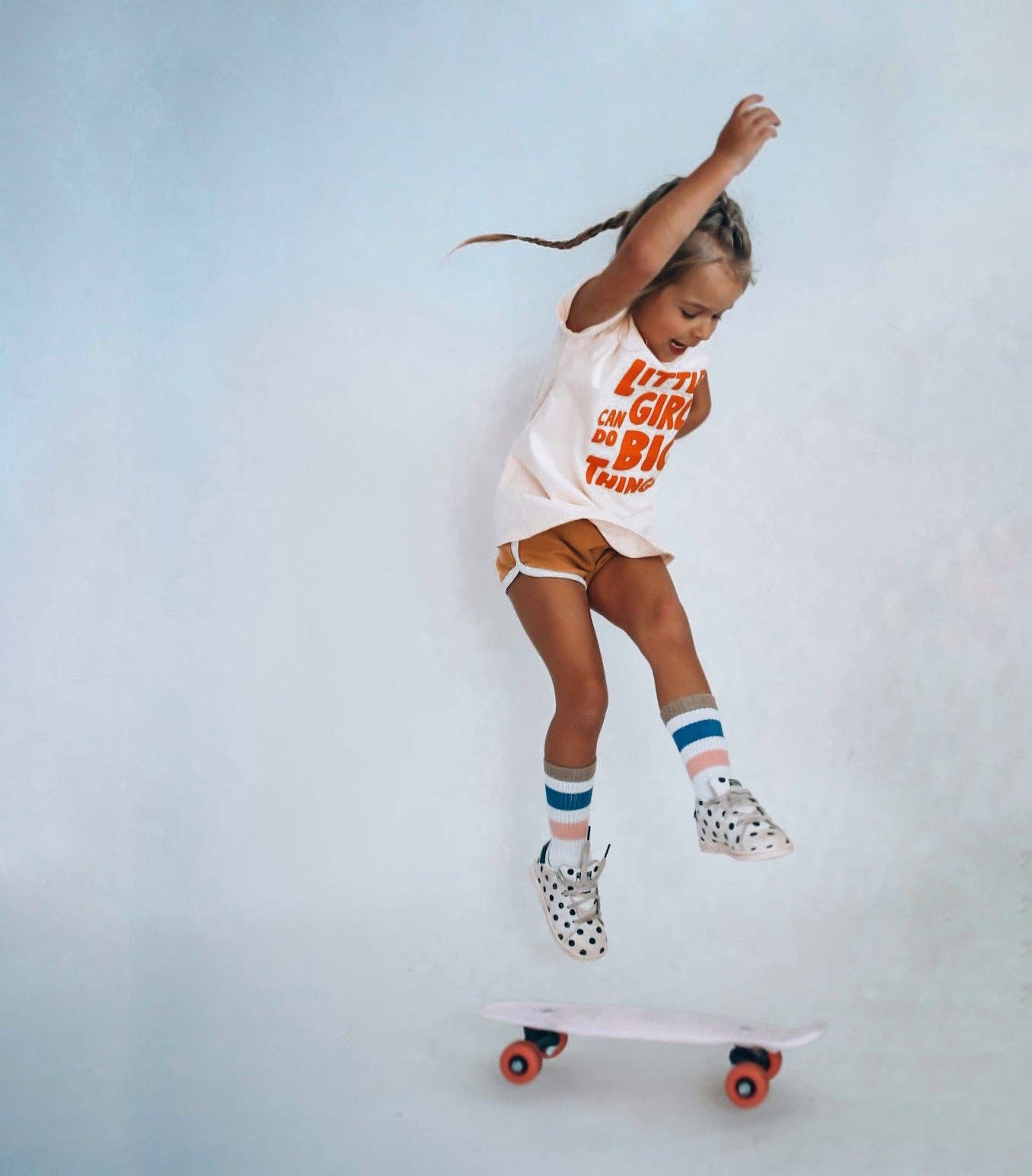 LITTLE GIRLS CANDO BIG THINGS in vivid orange | Kids Tee