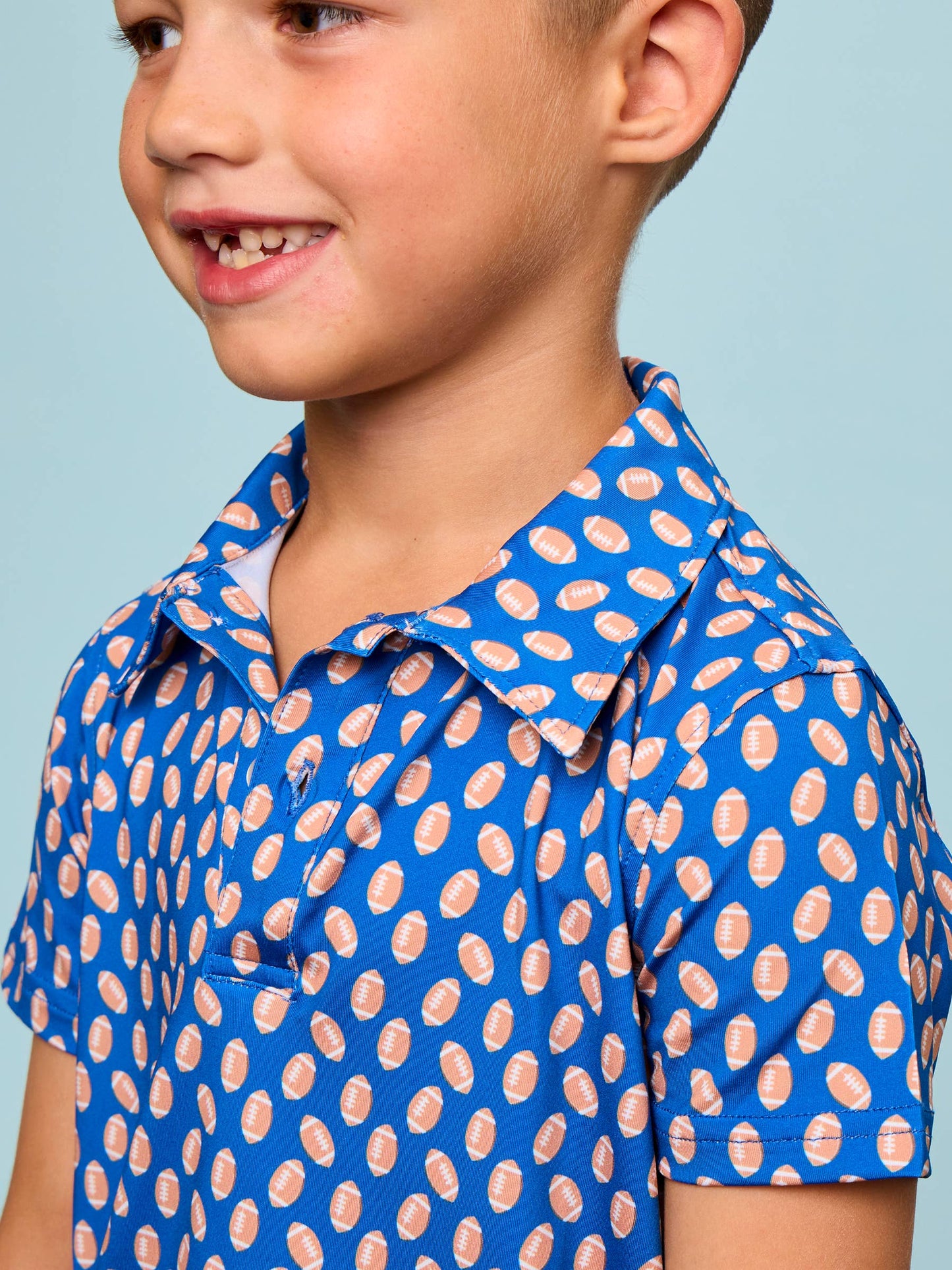 Boys Varsity Blue Football Frenzy Knit Short Sleeve Performance Polo